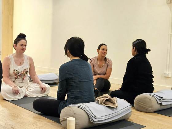 Community circle time and conversation in the studio